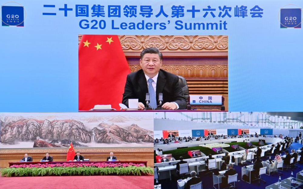 Xi urges concrete actions to address climate change, energy issues-1